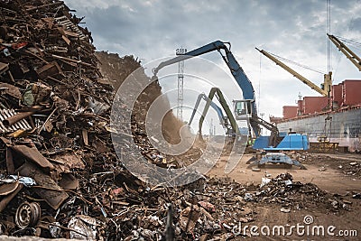 Scrap metal transshipment port. Editorial Stock Photo