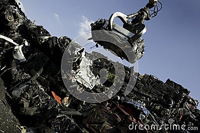 Scrap yard crane Stock Photo