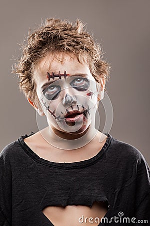 Screaming walking dead zombie child boy Stock Photo