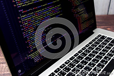 The screen of the program source code on the laptop Editorial Stock Photo