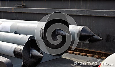 Screw piles. Construction materials for building foundation Stock Photo