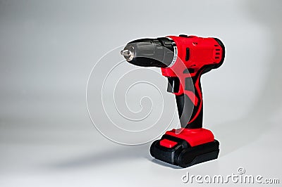 Screwdriver with rechargeable batteries, red, modern and reliable Stock Photo