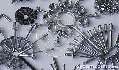 Screws, bolts, nails, dowels, rivets, nuts, Stock Photo