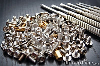 Screws and screwdrivers Stock Photo