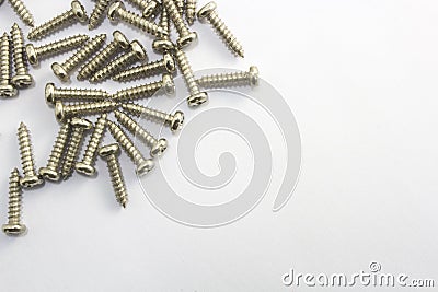 Screws on white background and spacing caption Stock Photo