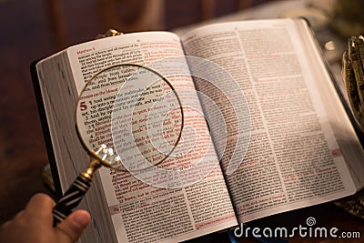 Scripture with gold praying hands Stock Photo