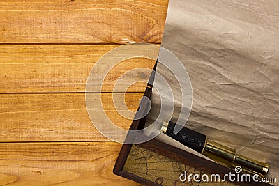 Scroll and telescope in the old box Stock Photo