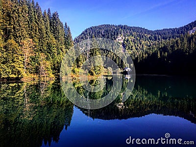 Scropoasa Lake in autumnal colours Stock Photo