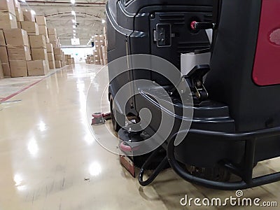 Scrubber drier for cleaning storage facilities. Close-up.Floor polisher.Floor cleaning machine. Floor maintenance. Stock Photo