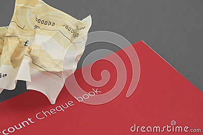 Scrunched blank cheque Stock Photo