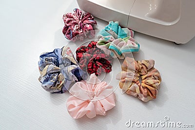 Scrunchies: handmade fabric colorful hair ties, sewing projects to do at home in quarantine Stock Photo