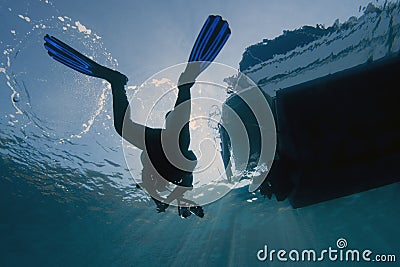 Scuba diver & dive boat Stock Photo