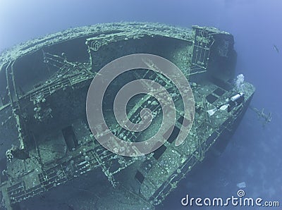 Scuba diver exploring a shipwreck Stock Photo