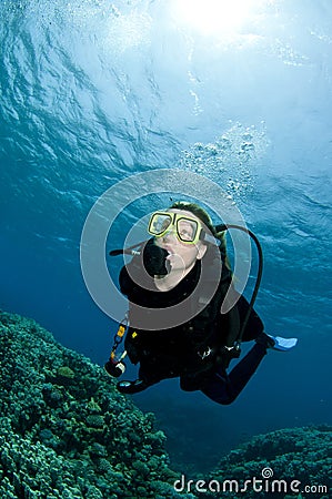 Scuba diver exploring undersea Stock Photo