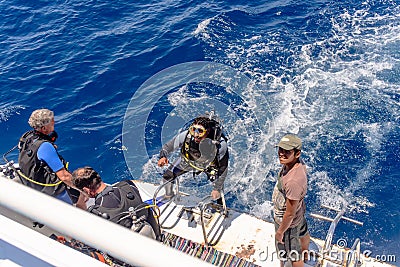 Scuba diver in his gear on a dive boat Editorial Stock Photo