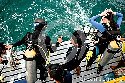 Scuba diver preparing jump to the sea for scuba diving test Editorial Stock Photo