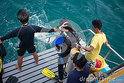 Scuba diver preparing jump to the sea for scuba diving test Editorial Stock Photo