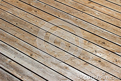 Scuffed up cedar deck floor texture background Stock Photo