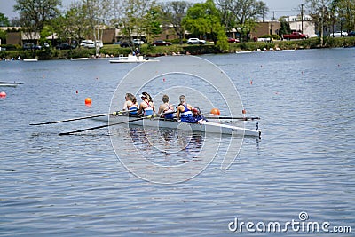 sculling on Cooper River in Camden County new jersey. Editorial Stock Photo