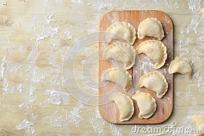 Sculpt pierogy and pelmeni concept. Stock Photo