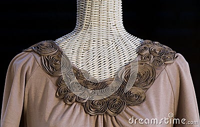 Sculpted flower neckline on new knit blouse Stock Photo