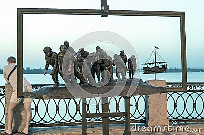 The sculptural composition `Barge Haulers on the Volga`. Evening view. Volga river embankment, Samara. Editorial Stock Photo