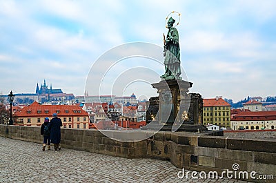 Sculptural compositions of Charles Bridge, Prague, Czech Republic. Saint Jan of Nepomuk 1683 Editorial Stock Photo