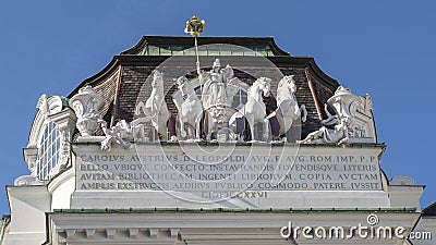 Sculpture with atop the State Hall of the Austrian National Library, seen from Josefsplatz Editorial Stock Photo
