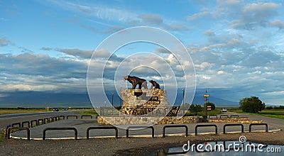 Sculpture of bears on the monument with the inscription: Here begins Russia - Kamchatka Editorial Stock Photo