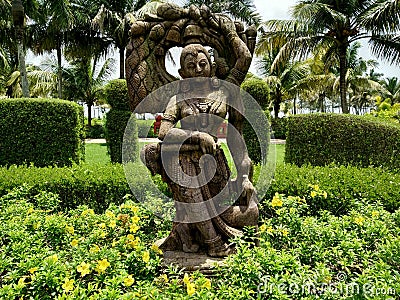 Beautiful Woman Sculpture in garden. Stock Photo