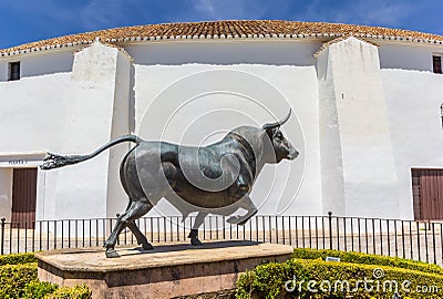 Sculpture of a bull in front of the bullring in Ronda Editorial Stock Photo