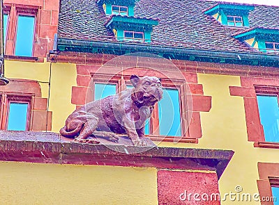 The sculpture of bulldog on the stone fence of State Archives Basel-stadt building in Basel, Switzerland Stock Photo