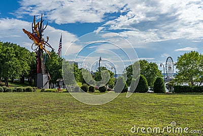 Sculpture called the Reckoning at the entrance to National Harbor near DC Editorial Stock Photo