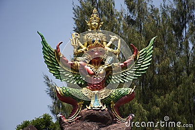 Sculpture carving stone Preserver Narai Song Suban figure or Narayana Hari riding on Garuda statue of Hinduism for thai people Editorial Stock Photo