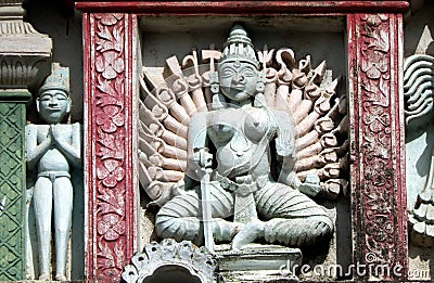 Sculpture of Durga on gopuram or 200 year old temple top Stock Photo