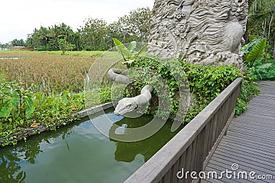 Sculpture of a snake at the monkey forest in Indonesia, Bali, 09.08.2018 Editorial Stock Photo