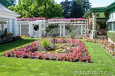 Sculpture and fountain at Butchart Gardens Stock Photo