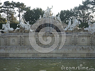 Sculpture and fountain between Schnbrunn Palace and The Gloriette, Vienna, Austria. Editorial Stock Photo