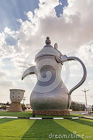 Sculpture of a giant traditional coffee pot Editorial Stock Photo