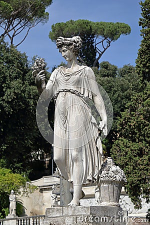 Sculpture Goddess of Abundance in Piazza del Popolo. Rome, Italy Stock Photo