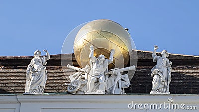 Sculpture with golden globe atop the State Hall of the Austrian National Library, seen from Josefsplatz Editorial Stock Photo