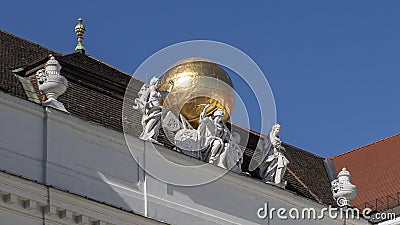 Sculpture with golden globe atop the State Hall of the Austrian National Library, seen from Josefsplatz Editorial Stock Photo