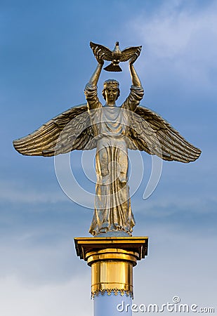 Sculpture `Good Angel of the World`. The statue of the Good angel carrying a dove in the hands of a symbol of peace and hope Editorial Stock Photo
