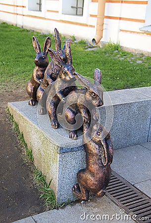 Sculpture of hares helping their friend at the territory of Peter and Paul fortress Stock Photo