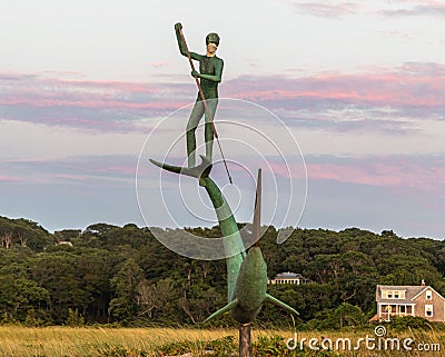 Sculpture of the harpooner during the sunset in the Marthas vineyard Stock Photo