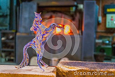 Sculpture of horse made of murano glass cooling in a factory in Murano, Italy....IMAGE Stock Photo