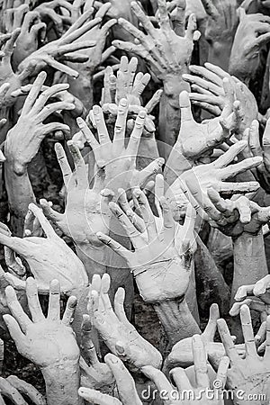 Sculpture of hundreds outreaching hands. White Temple, Chiang R Editorial Stock Photo