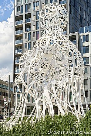 Sculpture by the name of Souce 2017 by Jaume PLENSA in a Griffintown park in Montreal Editorial Stock Photo