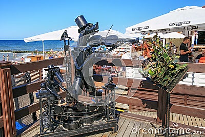 ZELENOGRADSK, KALININGRAD REGION, RUSSIA - JULY 29, 2017: Sculpture of iron stray dogs musicians which play a musical instrument. Editorial Stock Photo