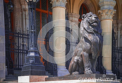 Sculpture of a lion near the Parliament building in Budapest Stock Photo